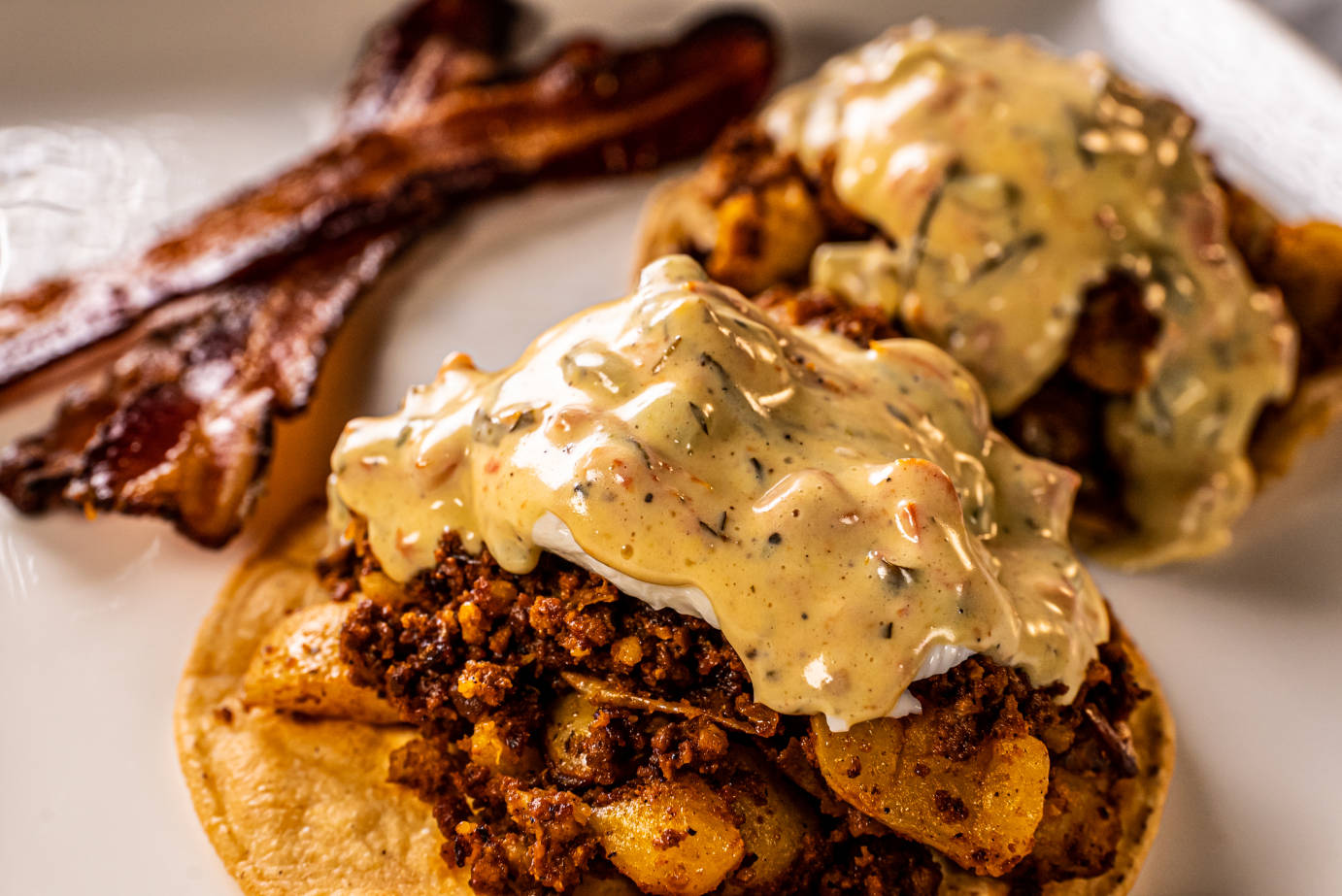 Meat and cheese on tortilla